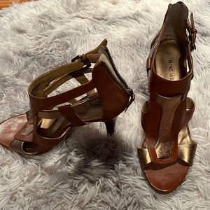 Nine West brown and gold heels . Buckles and a zip up the back- worn twice-